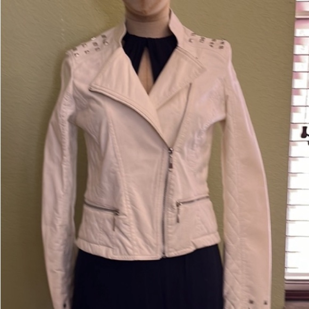 Studded moto/jacket white leatherette size small great used condition.